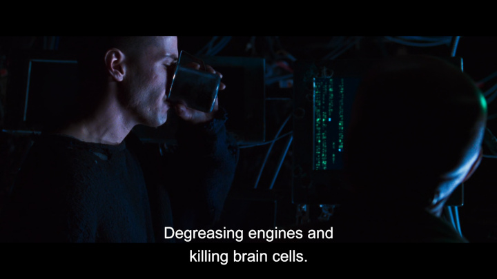 Screenshot of The Matrix where Neo drinks